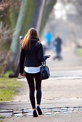 Image showing young woman in spring in park