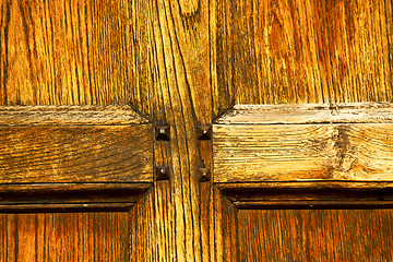 Image showing brebbia abstract   rusty    door curch  closed wood italy 