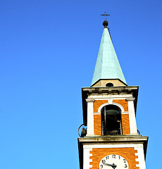 Image showing olgiate    the   wall  and church  sunny day 