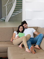 Image showing young couple making selfie together at home