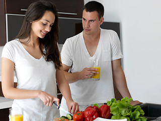 Image showing happy young couple in kicthen