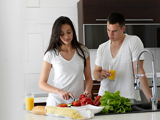 Image showing happy young couple in kicthen