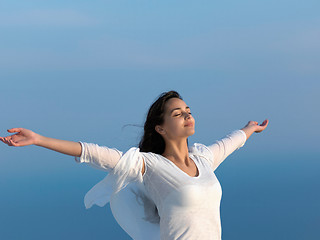 Image showing young woman enjoy sunset