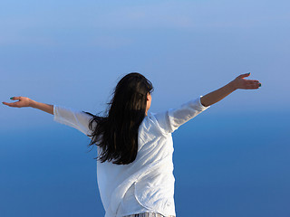 Image showing young woman enjoy sunset