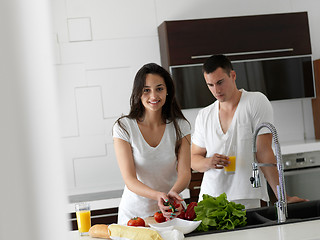 Image showing happy young couple in kicthen