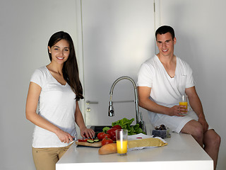 Image showing happy young couple in kicthen