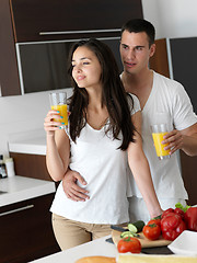 Image showing happy young couple in kicthen