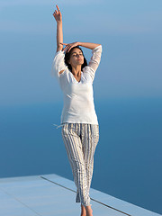 Image showing young woman enjoy sunset