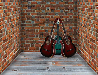 Image showing three guitars in the corner of the room