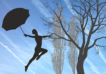 Image showing Woman jumps with Umbrella