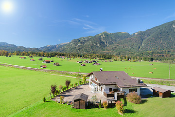 Image showing Alpine mountains summer green meadow in valley landscape