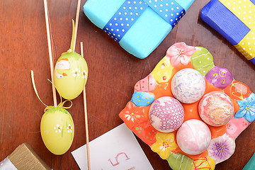 Image showing Easter background with eggs and gift box