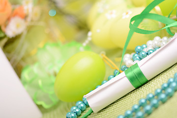 Image showing Easter background with eggs, ribbons and spring decoration