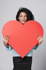 Image showing Girl holding big red heart shape