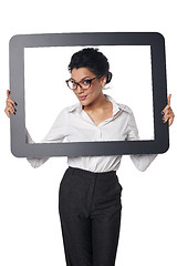 Image showing Smiling business woman looking through frame