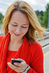 Image showing Young beautiful girl using mobile phone