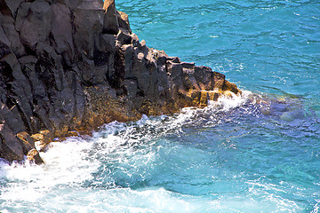 Image showing hervideros brown rock in white coast lanzarote   