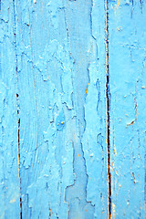Image showing dirty   paint in the   wood door and rusty nail