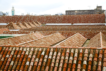 Image showing old moroccan  tile roof in the old sky
