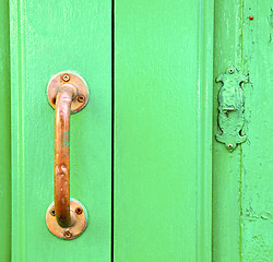 Image showing spain   brass knocker  abstract door wood in the 