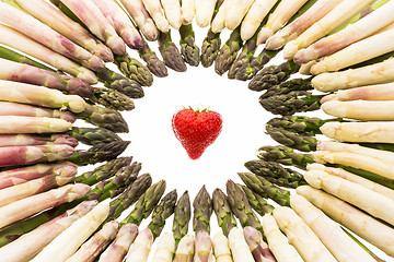 Image showing White And Green Asparagus Tips Point At Strawberry