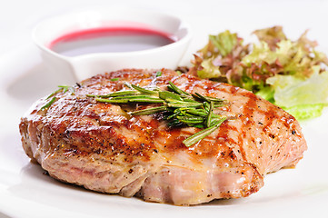 Image showing Grilled steaks and vegetable salad