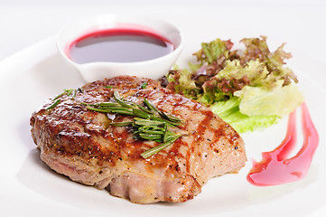 Image showing Grilled steaks and vegetable salad