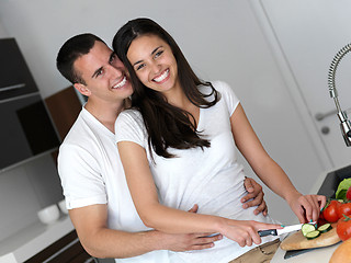 Image showing happy young couple in kicthen