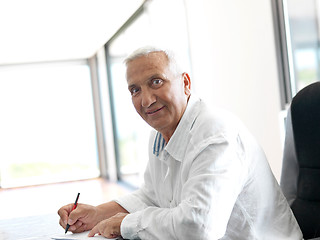 Image showing Portrait of senior man relaxing in sofa