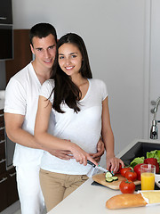 Image showing happy young couple in kicthen