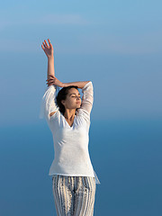 Image showing young woman enjoy sunset