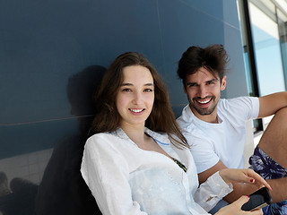 Image showing young couple making selfie together at home