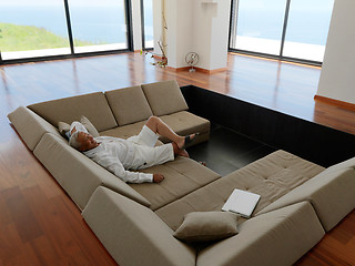 Image showing Portrait of senior man relaxing in sofa