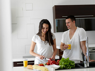 Image showing happy young couple in kicthen