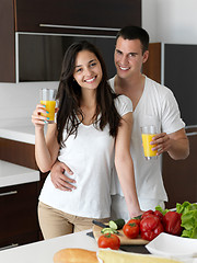 Image showing happy young couple in kicthen