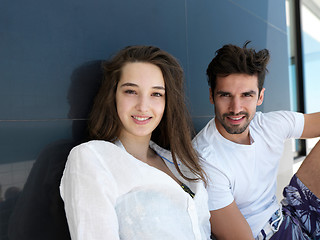 Image showing young couple making selfie together at home