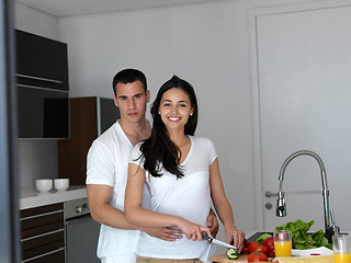 Image showing happy young couple in kicthen