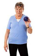 Image showing Senior woman with massage ball