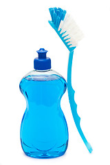 Image showing Blue dishwashing brush with liquid