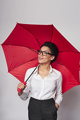 Image showing Happy woman with umbrella