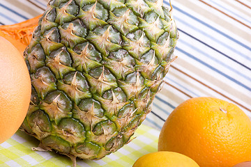 Image showing fresh pineapple with corn and orange