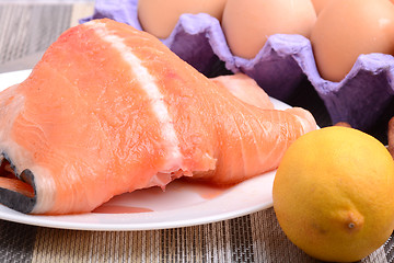 Image showing Slice of red fish salmon with fruits