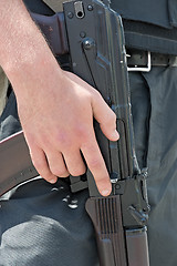 Image showing Ukrainian soldier with Kalashnikov rifle.