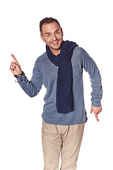 Image showing Trendy man pointing to the side