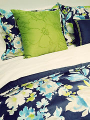 Image showing Blue and green bed linen with floral design