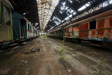 Image showing Cargo trains in old train depot