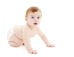 Image showing crawling curious baby