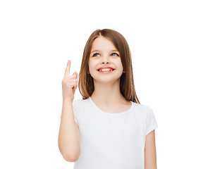 Image showing smiling little girl in white blank t-shirt