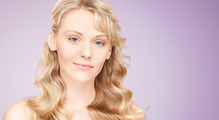 Image showing beautiful young woman face with long wavy hair