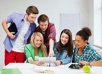 Image showing students looking at tablet pc at school